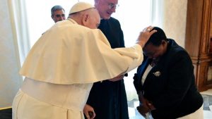 Pope Francis praying for Rt. Hon. Nabbanja 