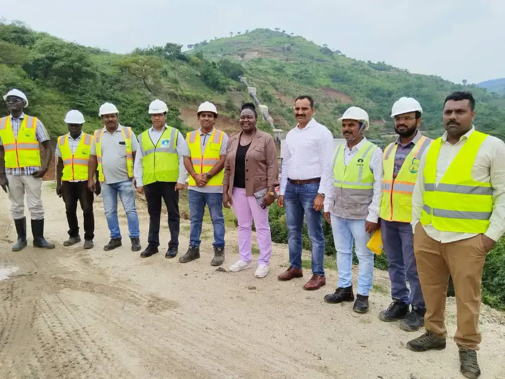 Minister Nankabirwa with the Engineers at Nyagak III Power Dam site